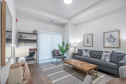 a living room with a couch and a coffee table