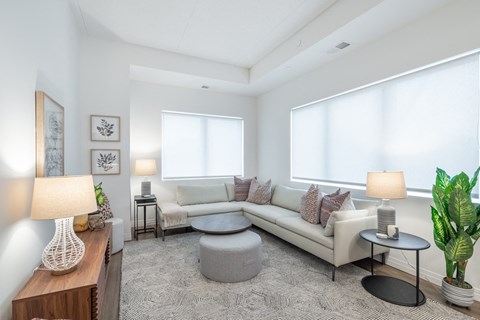 a living room with a couch and a table