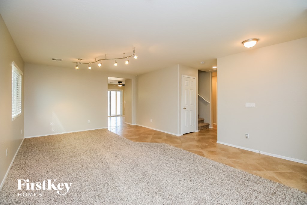 the living room and dining room are spacious and open to the hallway