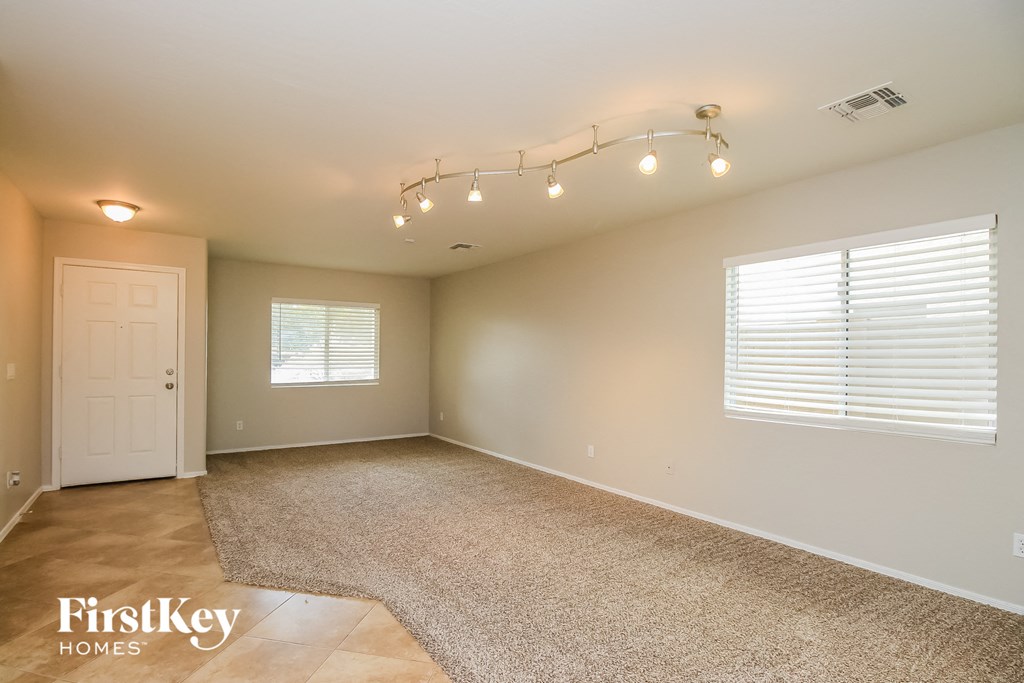 the living room and dining room are spacious and clean