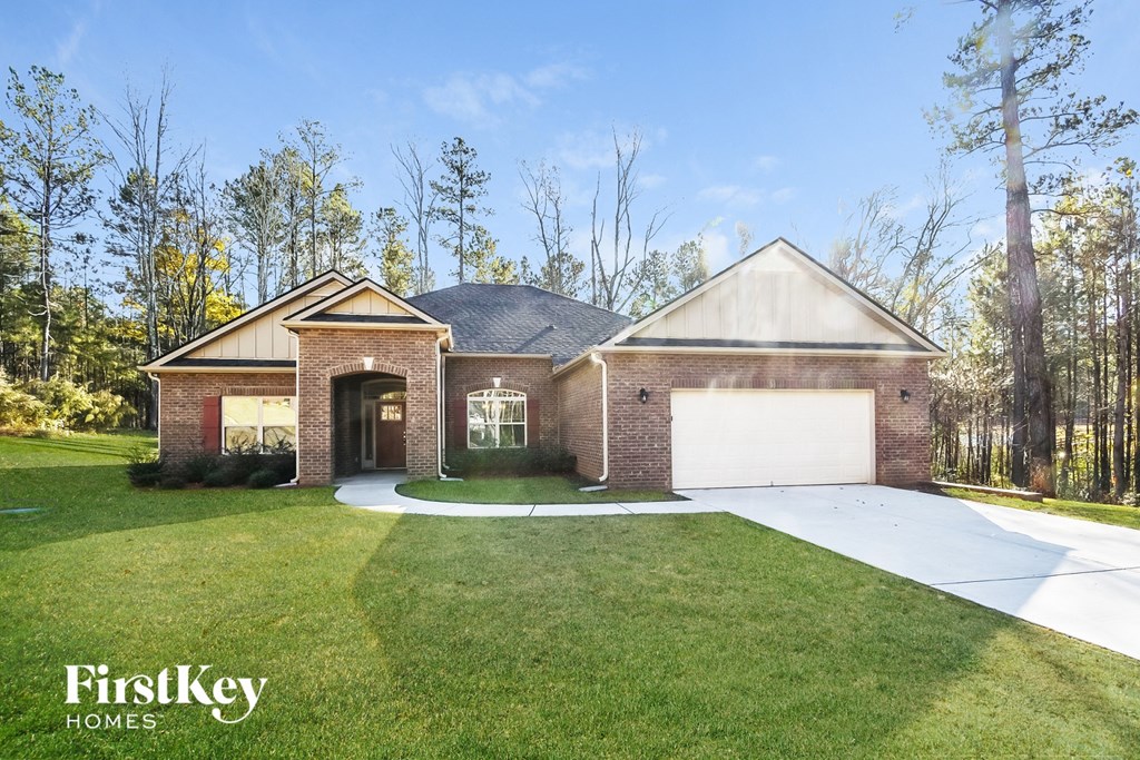 A house with a garage is shown in the image.