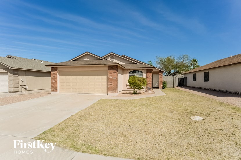 a house with a driveway and a garage door