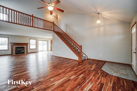 the family room is open to the living room and dining room