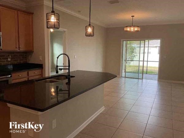 a kitchen with a sink and a counter top