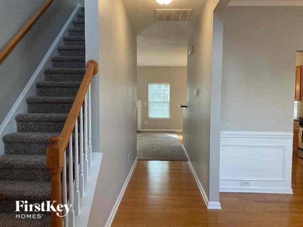 a staircase in a house with a wood floor