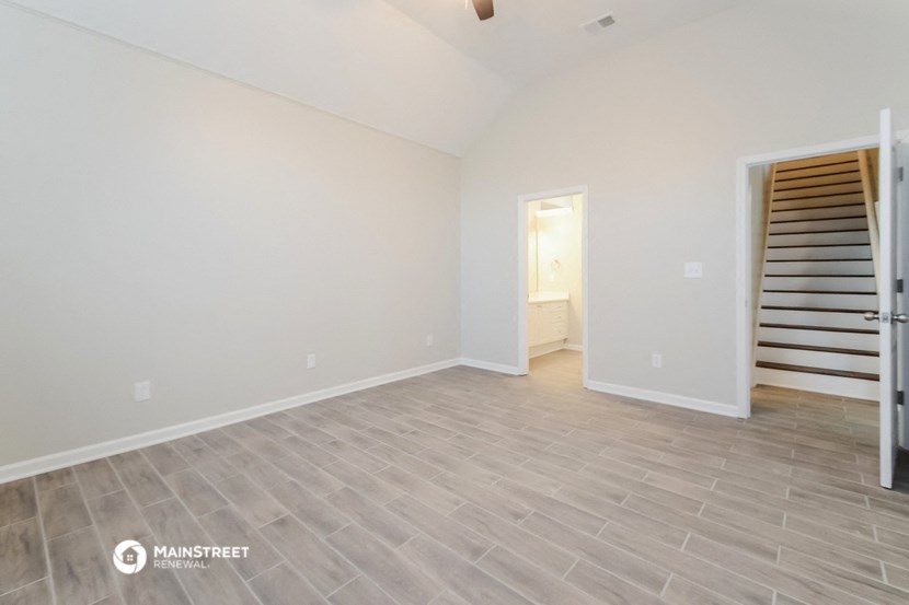 the upstairs living room with stairs to the loft