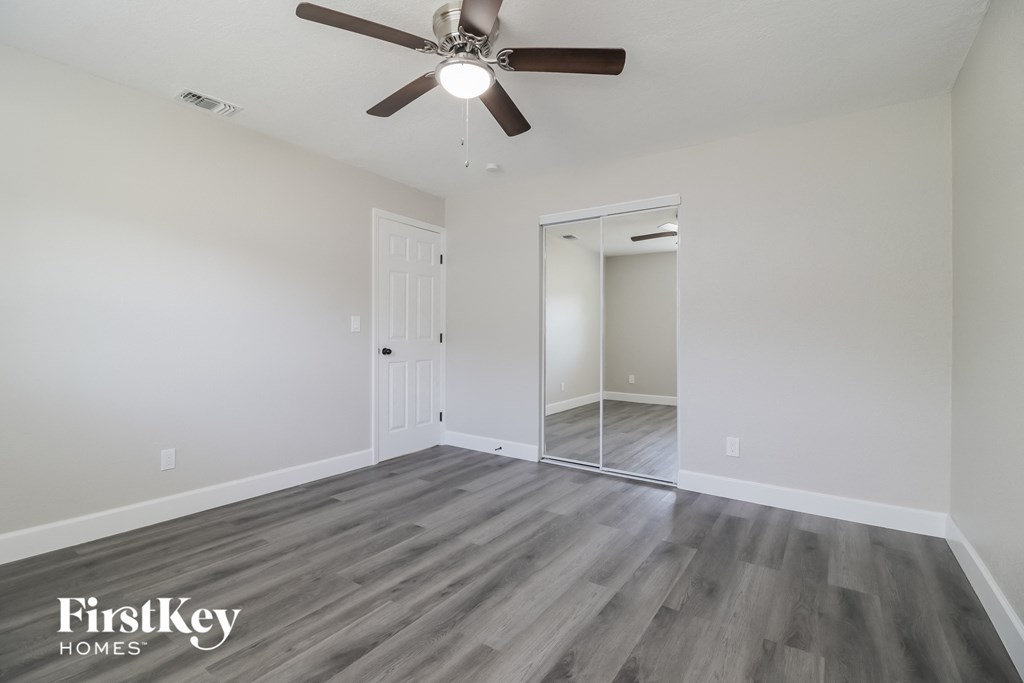 A room with a FirstKey Homes logo on the floor.
