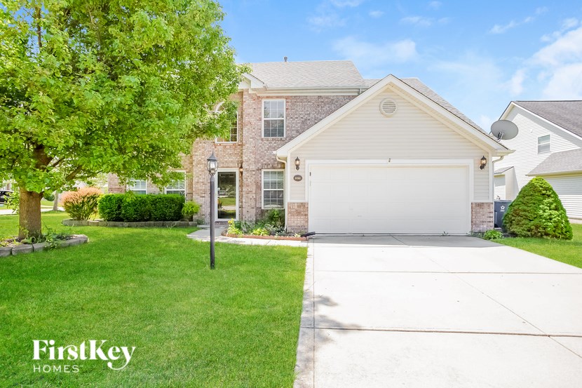 A house with a garage is for sale by FirstKey Homes.