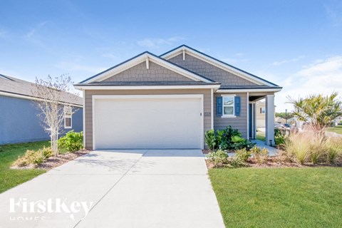 A house with a garage is shown in the image.