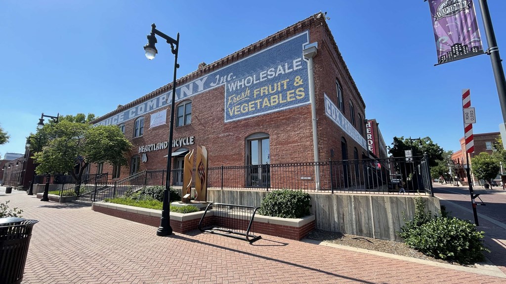a brick building with a sign on the side of it