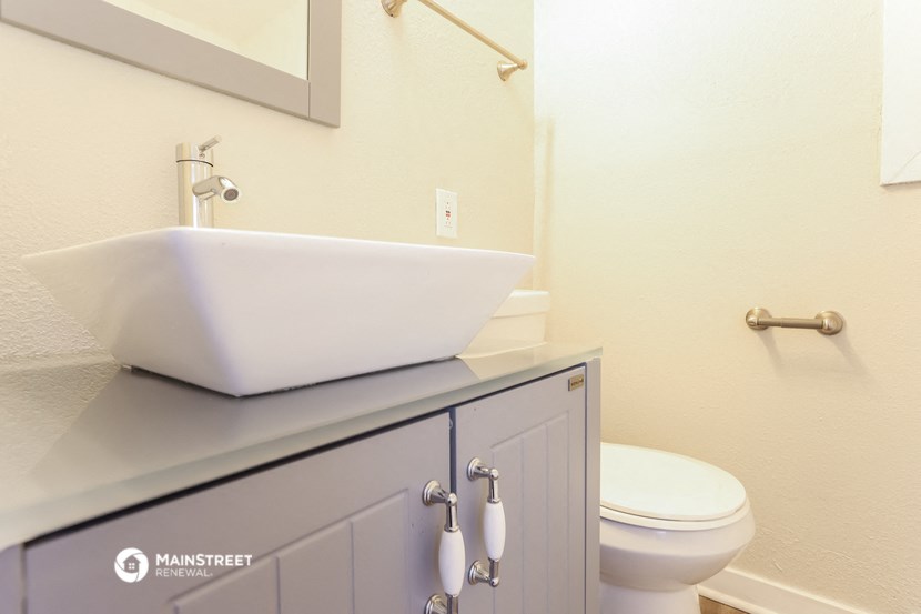 a bathroom with a sink and a toilet