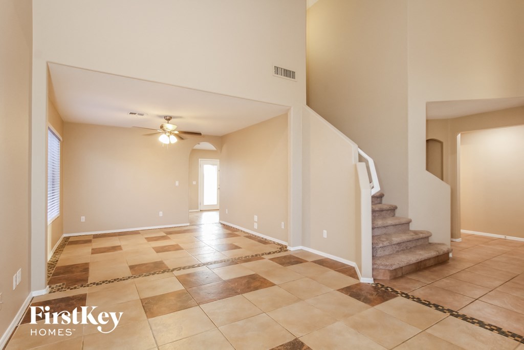 the living room is open to theoyer and stairs to the 2nd floor