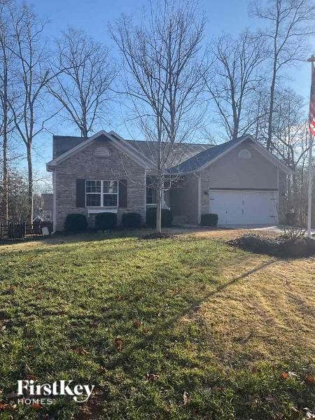 a house with a yard in front of it