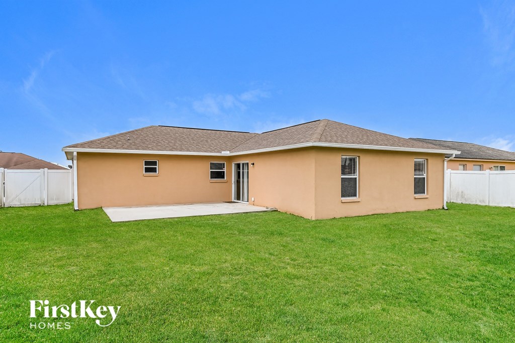 a house with a yard and a grassy yard