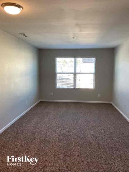 an empty room with a window in it