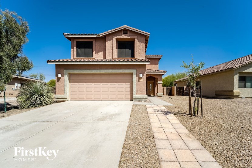 A house with a garage is for sale by FirstKey Homes.