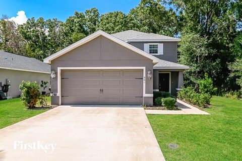 a garage door in front of a house