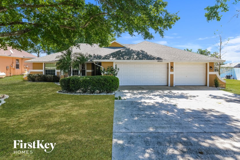 A house with a garage is for sale by FirstKey Homes.