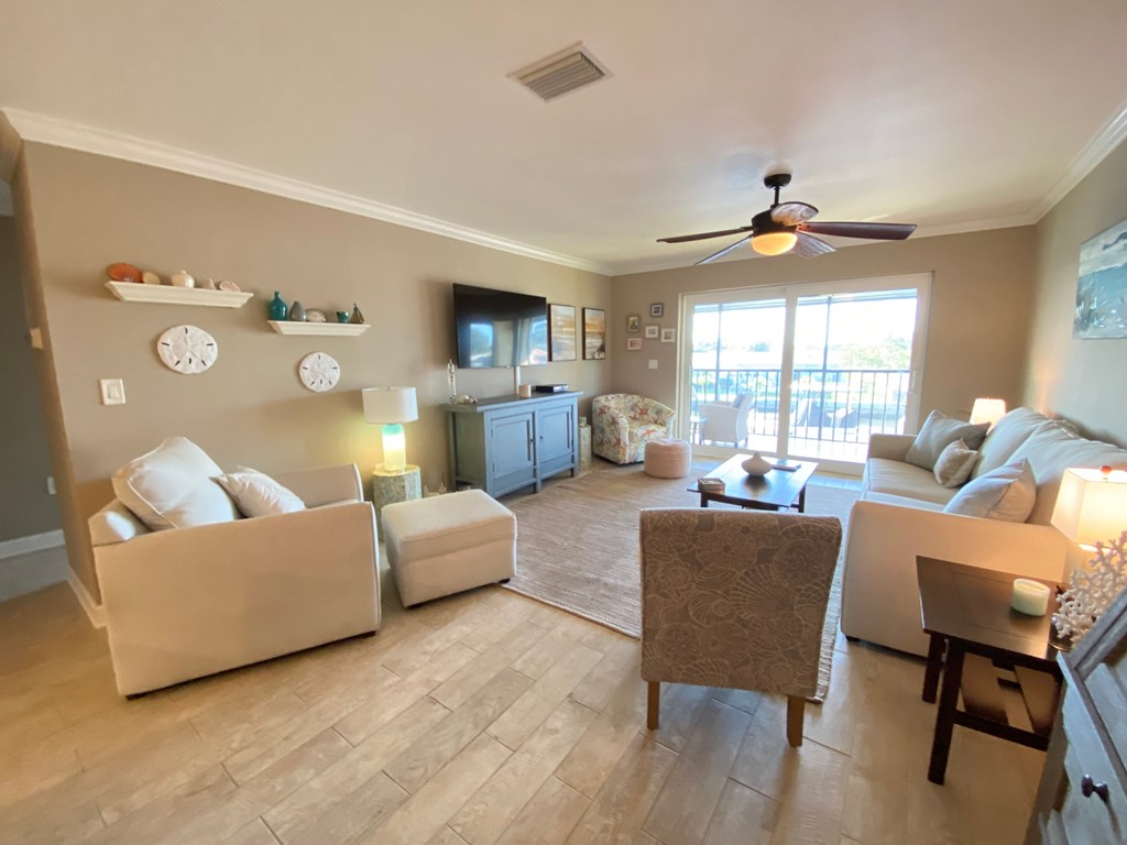 the living room is open to the kitchen and living room