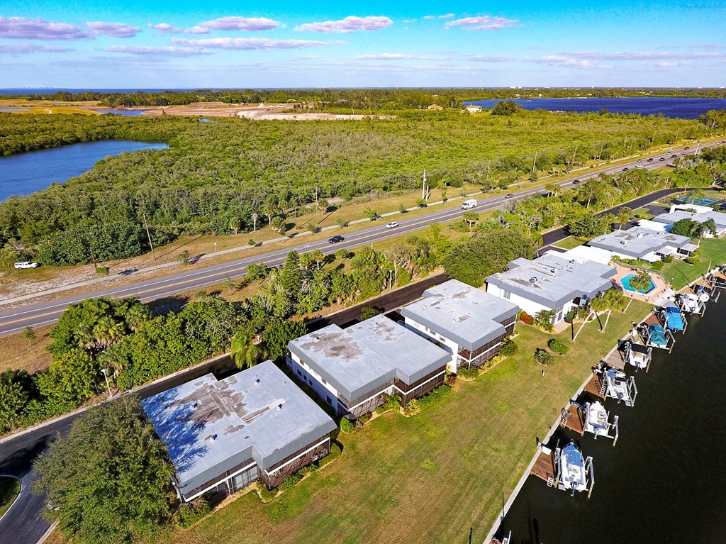 a group of trailers parked next to a body of water