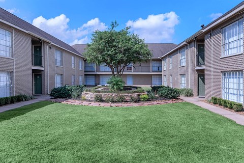our apartments have a spacious courtyard and green grass