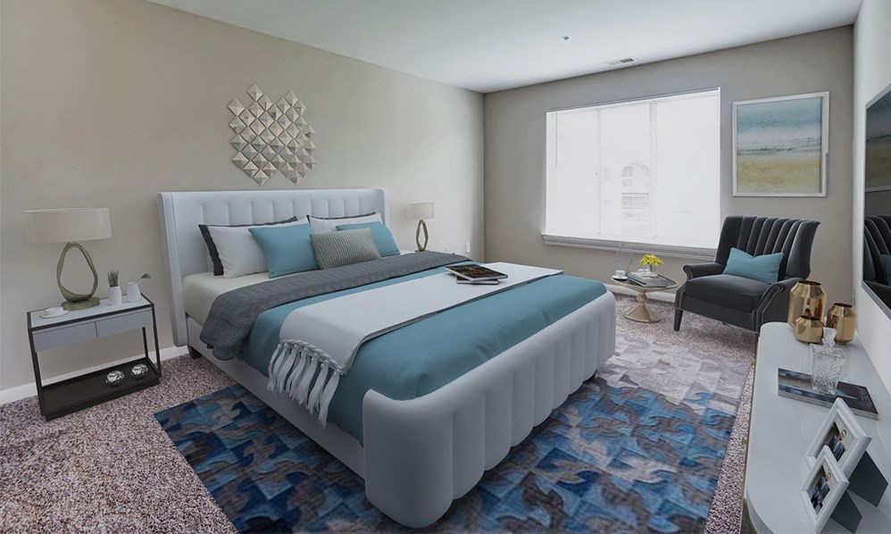 a bedroom with a white bed and blue pillows