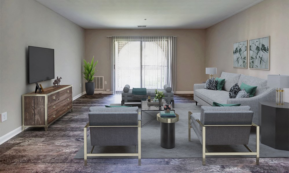 a living room with couches and chairs and a television