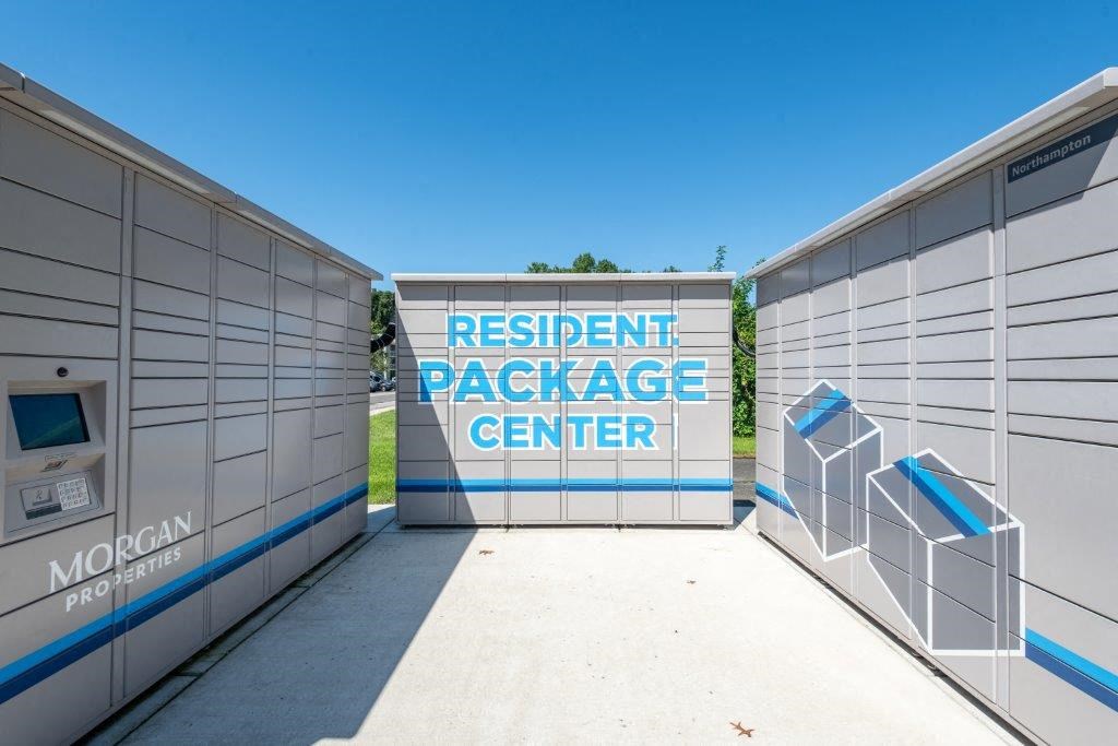 the rental package center is located in front of the entrance to the building