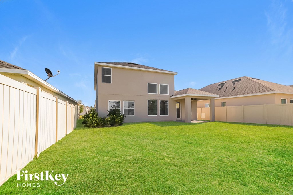 a large lawn in front of a house