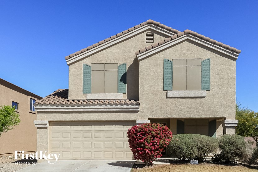 a house with a garage and a garage door