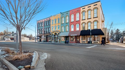 a row of colorful buildings on a city street