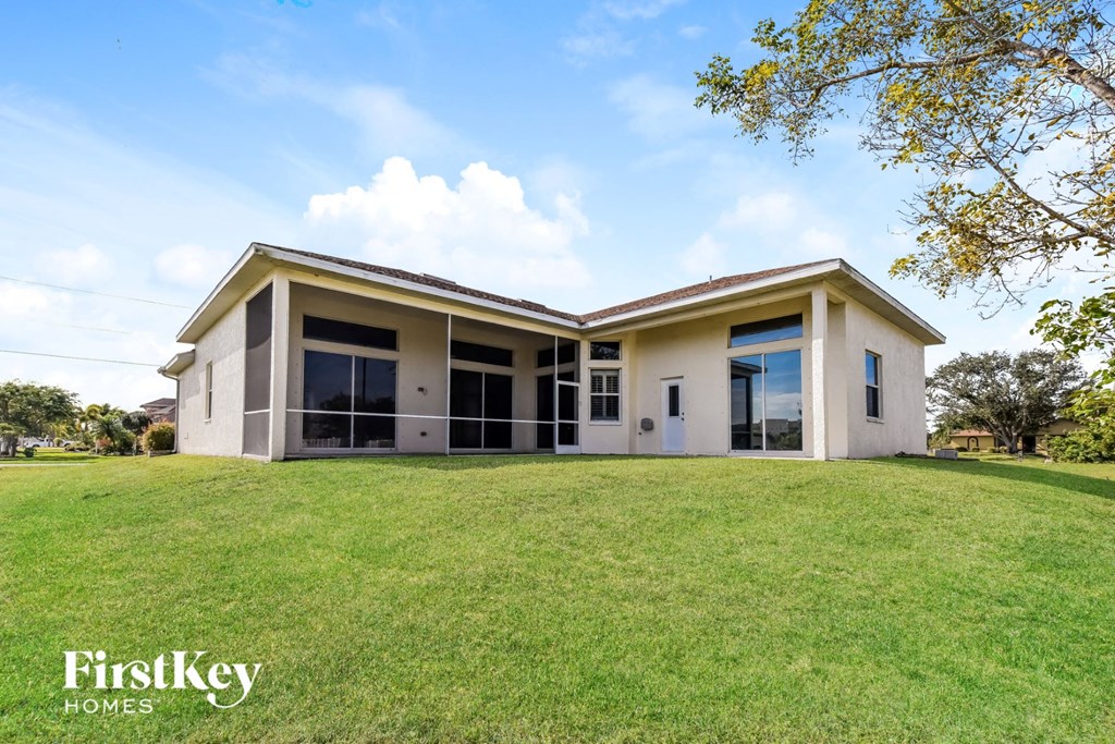 a house with a lawn in front of it