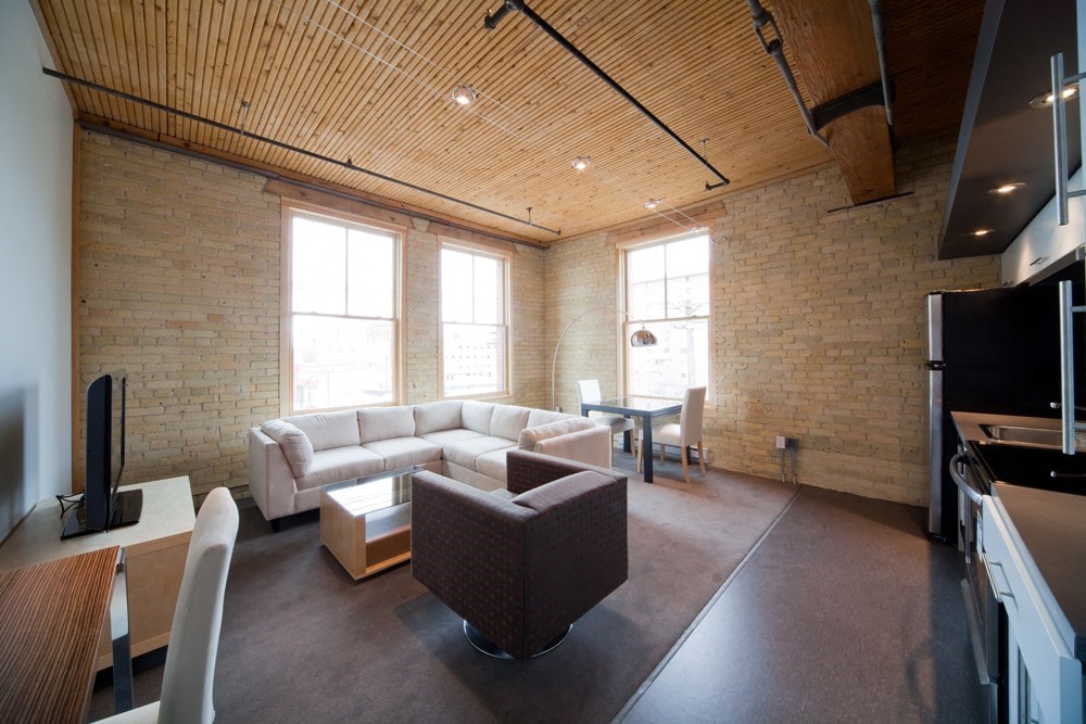 a living room with a couch and a table