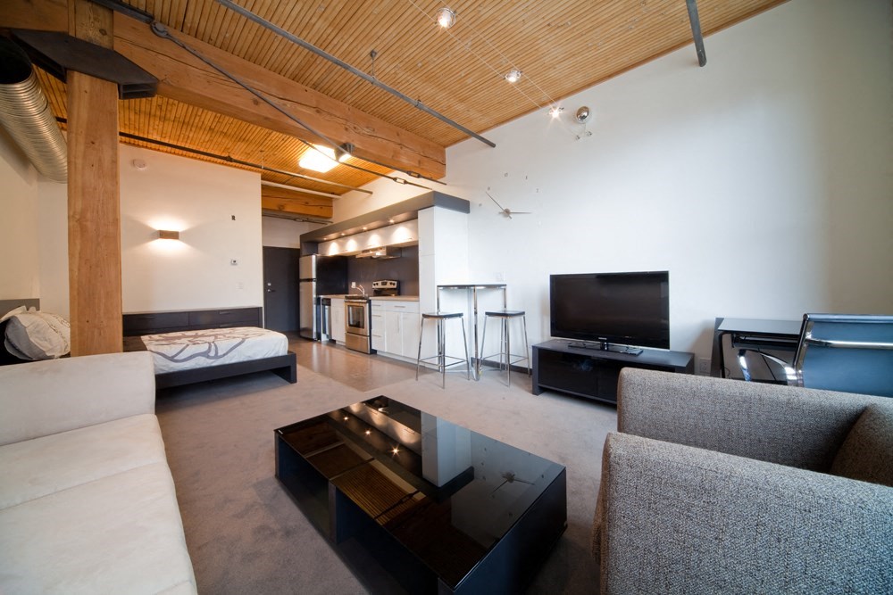 a living room with a couch and a table