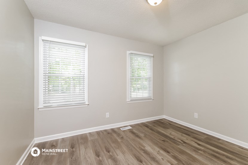 the spacious living room of our studio apartment at university estates in saint louis