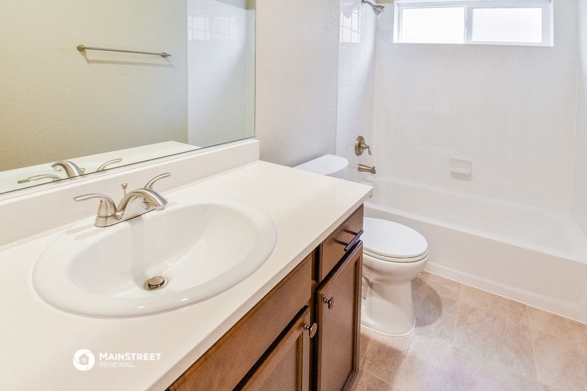 a bathroom with a sink and a toilet
