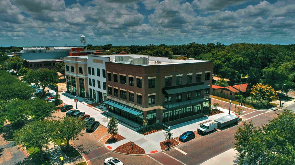 a view of a building from above of a city street