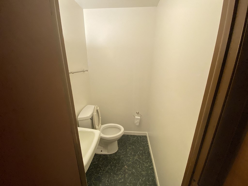 a small bathroom with a toilet and a sink