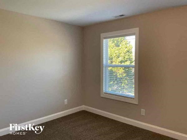 an empty room with a window in it