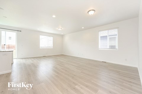 the living room is spacious and ready to be used as an office