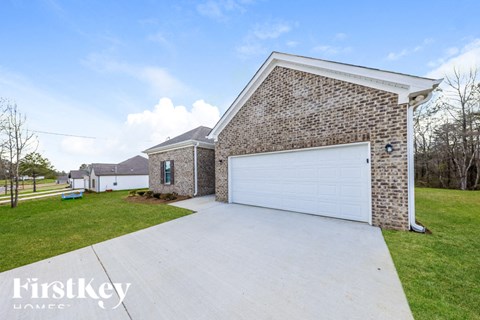 A house with a garage is for sale by FirstKey Homes.