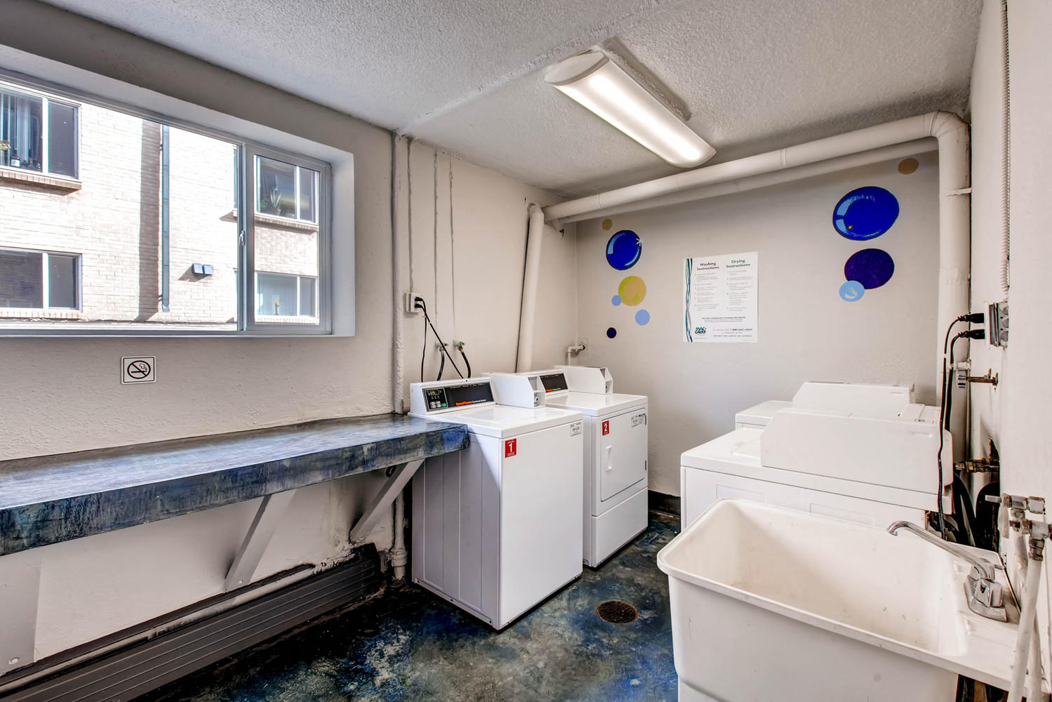 Our Apartment Building Laundry Room at Off Broadway Flats in Englewood Colorado