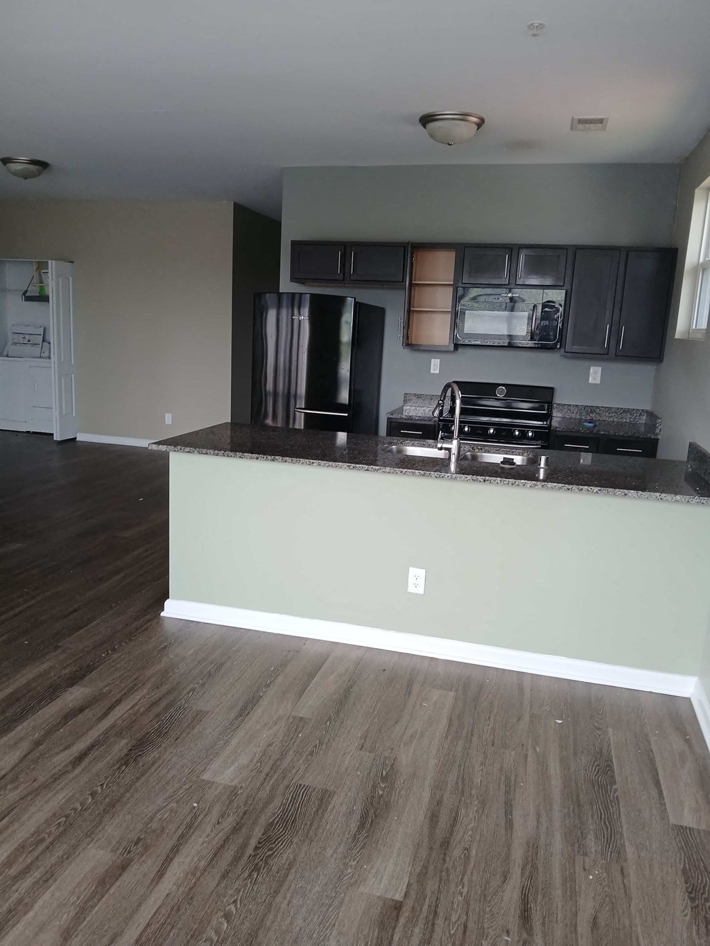 a kitchen with a counter top and