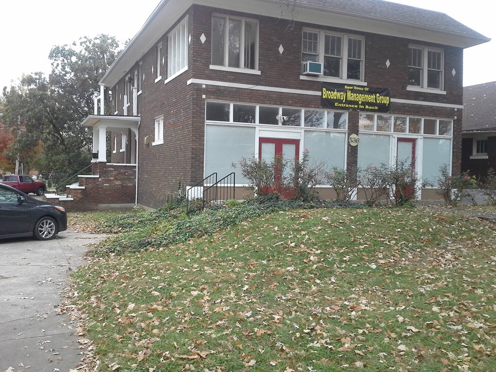 a building with a sign on the front of it