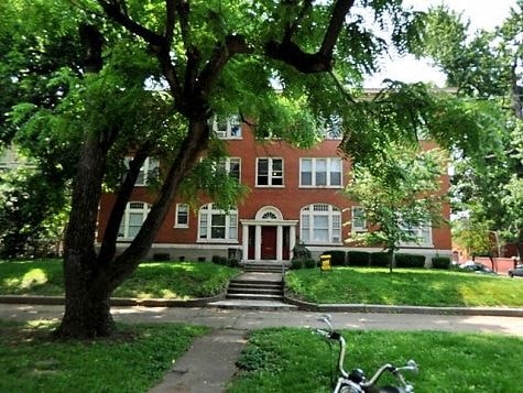 a house with a bike parked in front of it