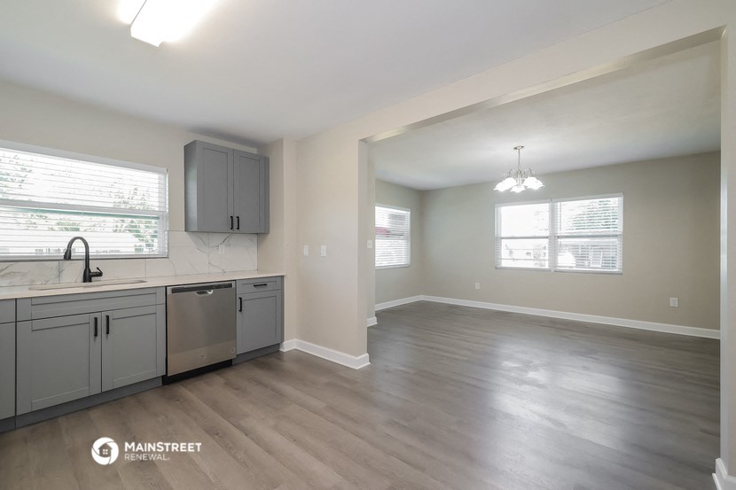 the kitchen and living room of an apartment