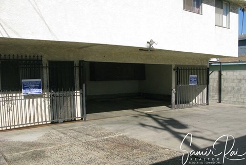 the entrance to a parking garage of a building