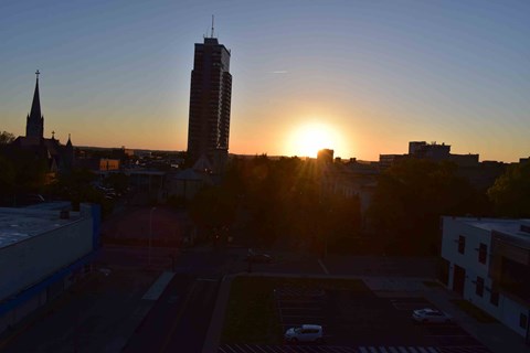 the tallest building at sunset in the city