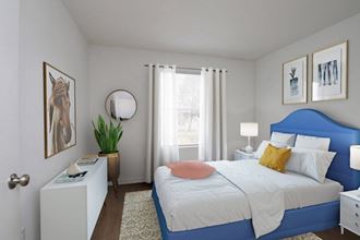 a blue and white bedroom with a bed and a window