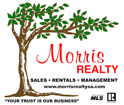 the logo with the words rents realty and a tree